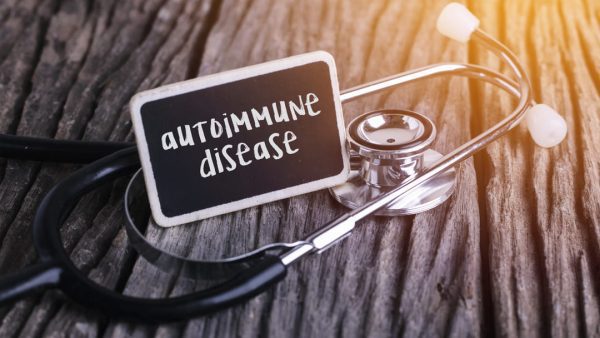 Autoimmune disease sign on top of a stethoscope.
